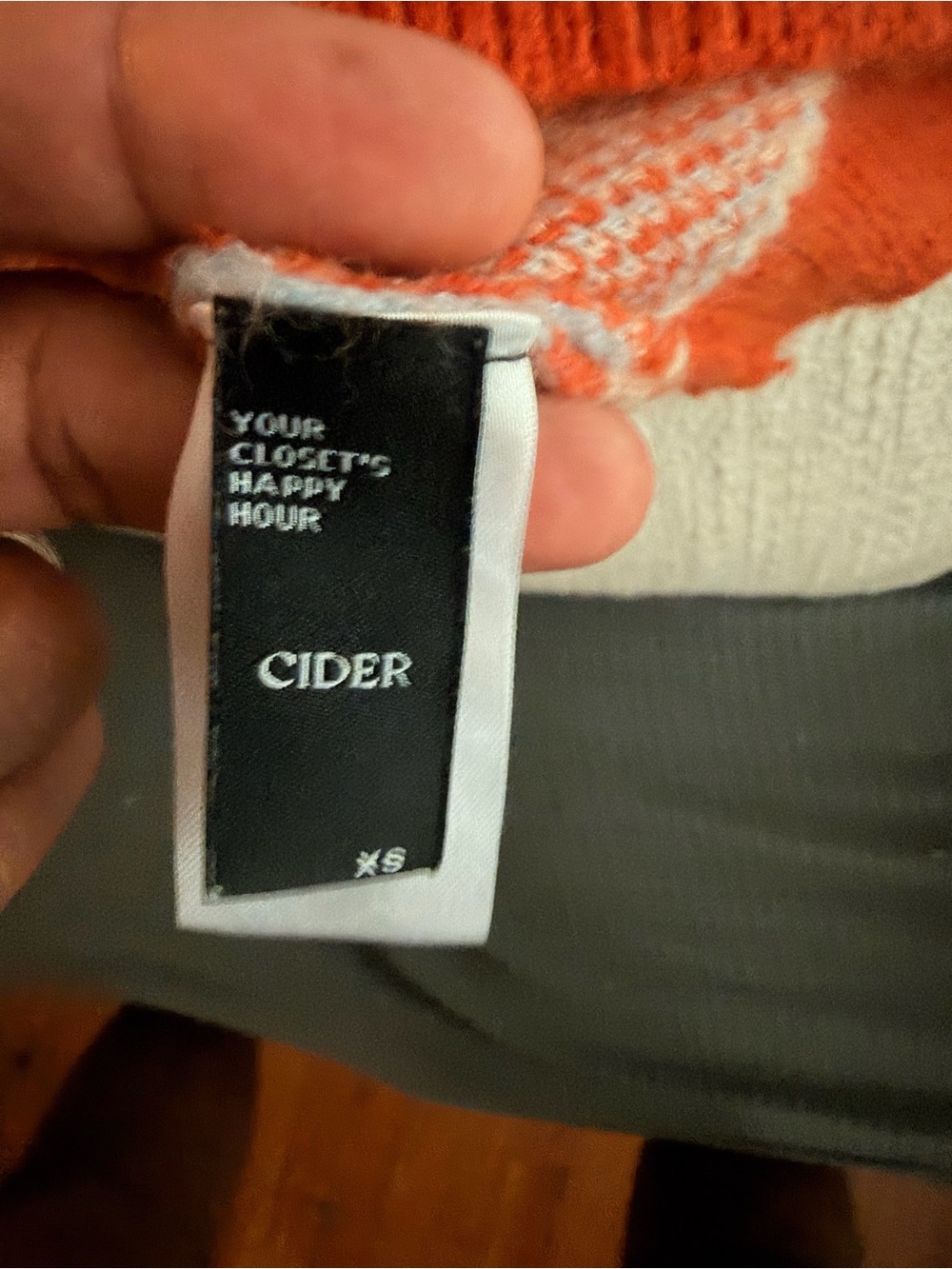 Cider Orange and White Women's Sweater Label Detail